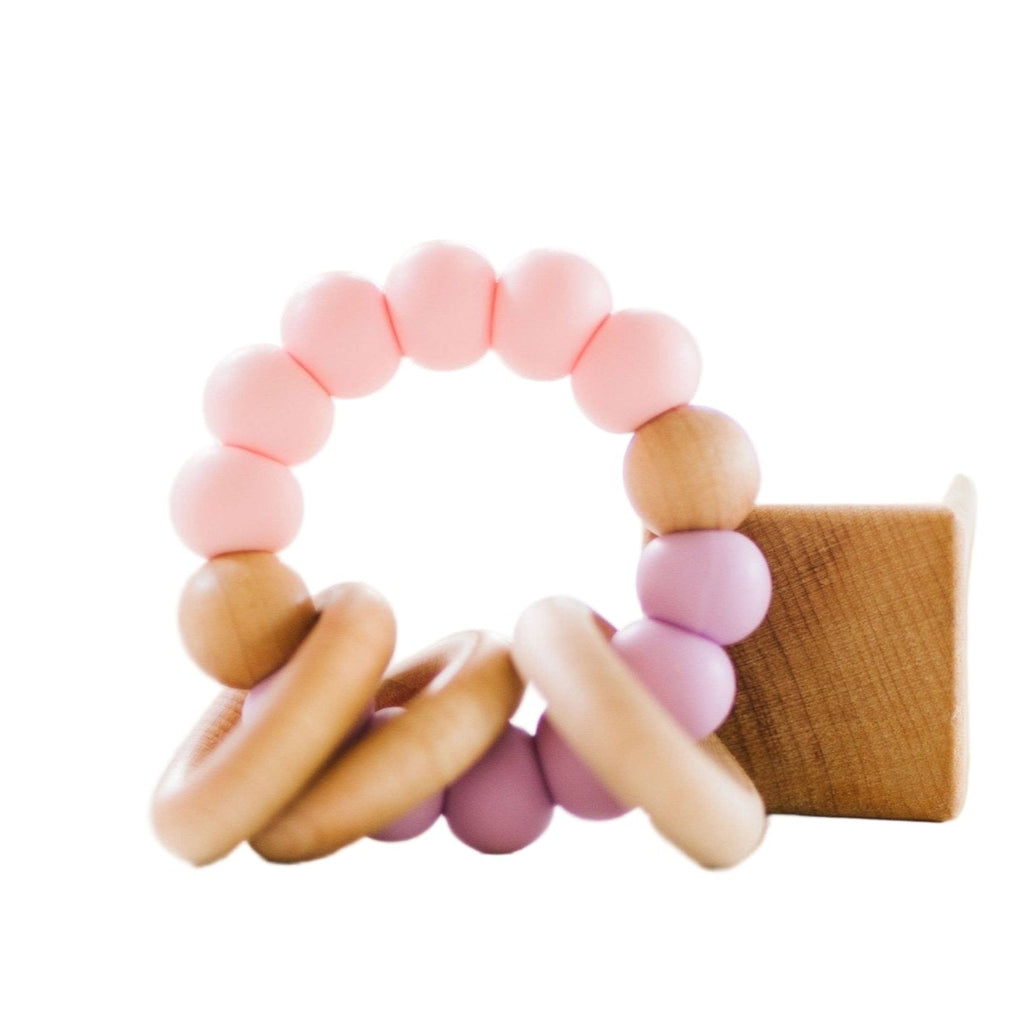 Colorful teething ring on a white background